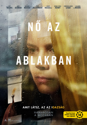 Nő az ablakban